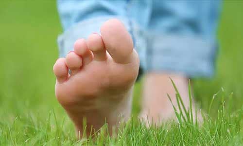 Barefoot-Walking-on-Dew-Kissed-Grass